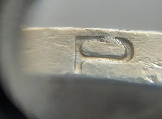 (6931) 1 гривня 2006 різновид викрошки у букві "Р" слова "ГРИВНЯ" на гурті + двійний удар на реверсі (1 гривна 2006 брак) Ціна