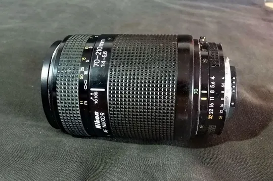 Об&#039;єктив Nikon AF телеобъектив Nikkor 70-210mm 1:4-5.6 Japan Ф62мм дефект Вживане Де купити