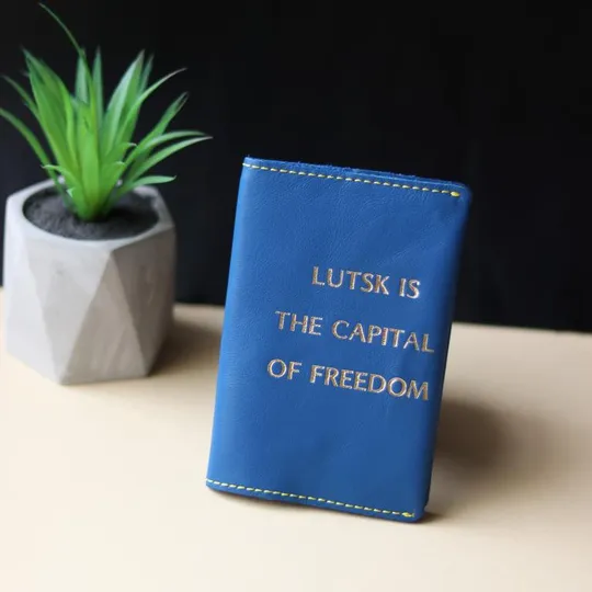 Обкладинка для паспорта "Lutsk is the capital of freedom" синя з позолотою,жовта нитка. З аукціону