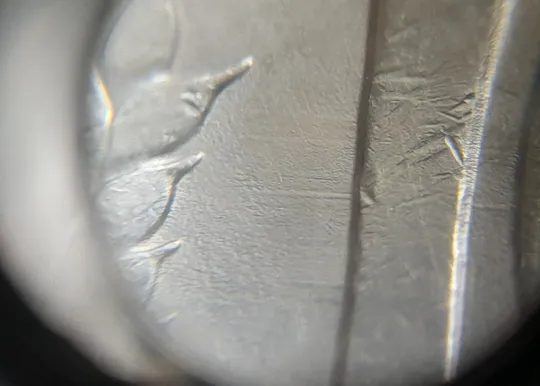 (7980) 10 рублей 1993 РФ ММД царапини штемпеля на реверсі (брак) Де купити