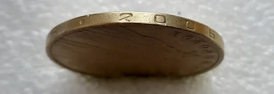 (4682) 1 гривня 2006 різновид викрошки у цифрі "2" слова "2006" на гурті (1 гривна 2006 брак) З аукціону