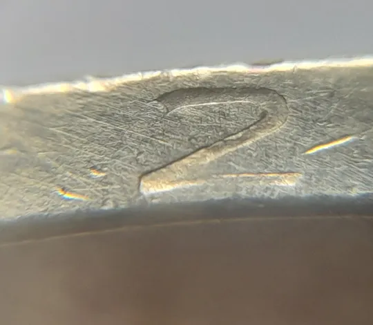 (5121) 1 гривня 2006 двійний удар на реверсі + викрошка вверху "2" слова "2006" на гурті (1 гривна 2006 брак) Ціна