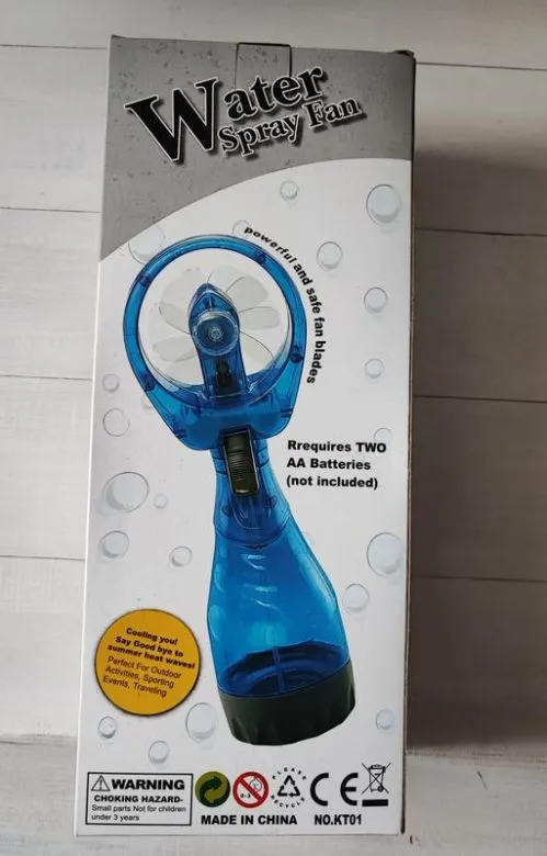 Портативний ручний міні вентилятор на батарейках з розпиленням води water spray fan Де купити