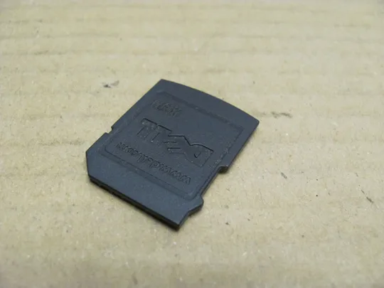 номер0017-15 заглушка SD  корпуса N097M для Dell Inspiron 1570 Latitude 2120 оригінал З аукціону