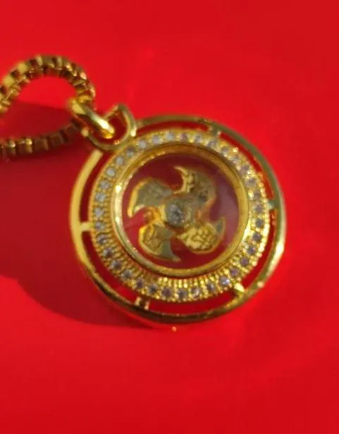 интересная красивая подвеска  підвіска с вращающейся деталью-&quot;мельницей&quot; внутри cd345 Ціна