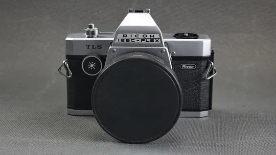 фотоаппарат пленочный механический Ricoh 126C Flex с объективом Rikenon 100mm/2,8 Ф67мм Де купити