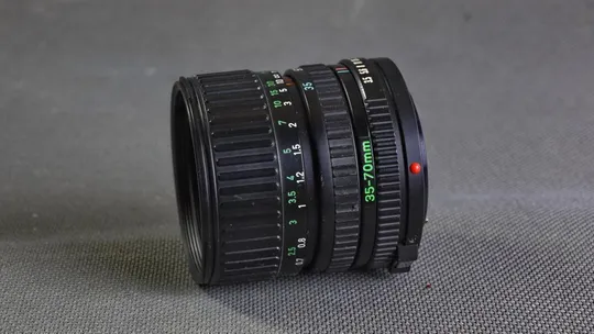 объектив Canon FD Canon 35-70mm/3.5-4.5 MC Ф52мм на полный кадр 24x36mm Де купити