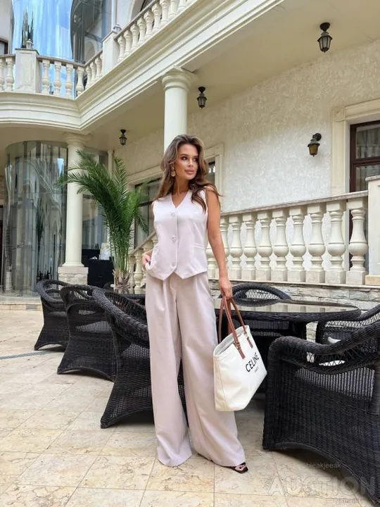 Жіночий костюм жилетка і палаццо колір бежевий Інтернет-аукціон