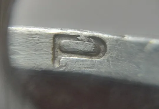 (7328) 1 гривня 2006 різновид викрошки у букві "Р" слова "ГРИВНЯ" на гурті + зминання на реверсі (1 гривна 2006 брак) Ціна