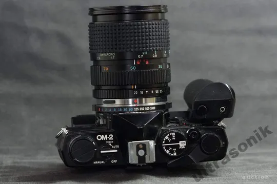 пленочный фотоаппарат Olympus OM-2 + Tokina 28-70mm/3.5 RMC + бустер Ціна
