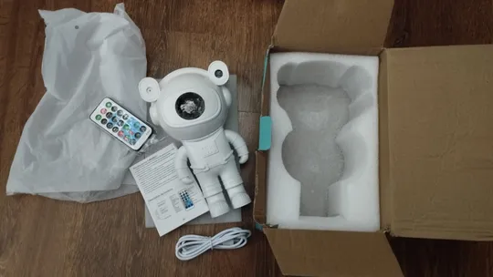 Купити Лазерний проектор зоряного неба.Нічник Космонавт.Bluetooth.З колонкою!