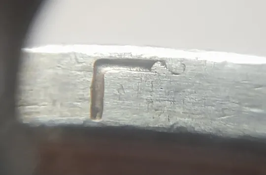 (5383) 1 гривня 2006 зминання букв "...ОДИМИР ВЕ..." на реверсі + викрошки на гурті (1 гривна 2006 брак) Ціна