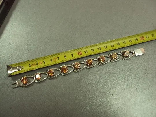 Женский браслет с оранжевыми желтыми и белыми вставками серебро 925 проба украина вес 34,34 г 18 см Недорого