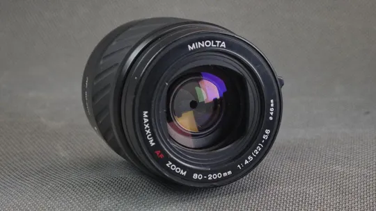 Об&#039;єктив телевик Minolta Maxxum AF Zoom 80-200mm 1:4.5 (22)-5,6 Ф46мм Sony на полный кадр 24x36mm Вживане Ціна