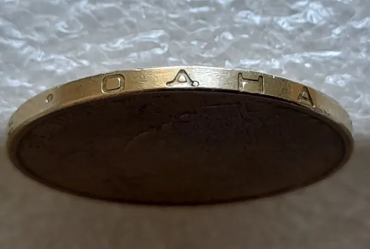 (6357) 1 гривня 2005 викрошка у букві "Д" слова "ОДНА" на гурті (1 гривна 2005 брак) Ціна