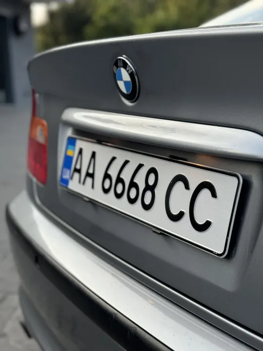 Тримач номеру безрамочний чорний комплект (4шт) Ціна