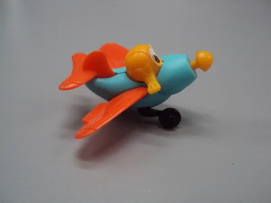 Фигурка киндер сюрприз самолет с глазками Disney самолетик бежит №18590м Продаж
