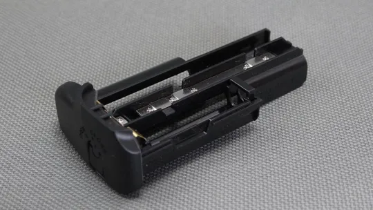 Кассета магазин батарейного блока Canon АА Battery magazine Вживане Ціна