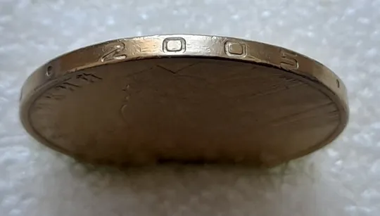 (5717) 1 гривня 2005 викрошка в букві "И" слова "ГРИВНЯ" на гурті (1 гривна 2005 брак викрошка) Продаж