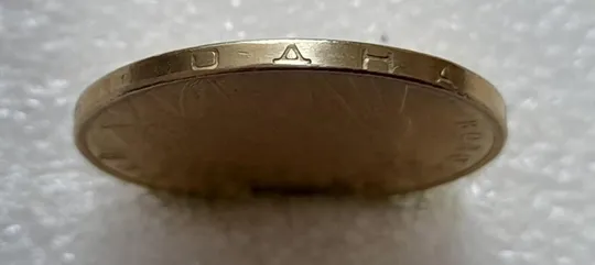 (4717) 1 гривня 2006 різновид викрошки у цифрі "2" слова "2006" на гурті (1 гривна 2006 брак) Продаж