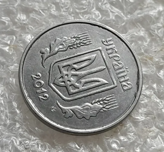 (7250) 2 копійки 2012 лишній метал, викрошки на аверсі (2 копейки 2012 брак крокодил) Продаж