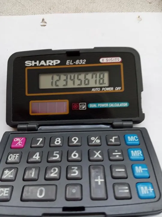 Калькулятор Sharp. Made in Japan Недорого