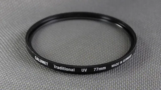 Купити CALUMET Traditional (UV) 77мм. защитный ультрафиолетовый светофильтр 100% original Germany Вживане
