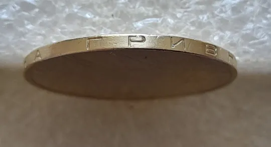 Купити (7328) 1 гривня 2006 різновид викрошки у букві "Р" слова "ГРИВНЯ" на гурті + зминання на реверсі (1 гривна 2006 брак)